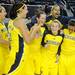 Members of the Michigan women's basketball celebrate their graduating seniors during senior night at Crisler Center on Thursday. Melanie Maxwell I AnnArbor.com